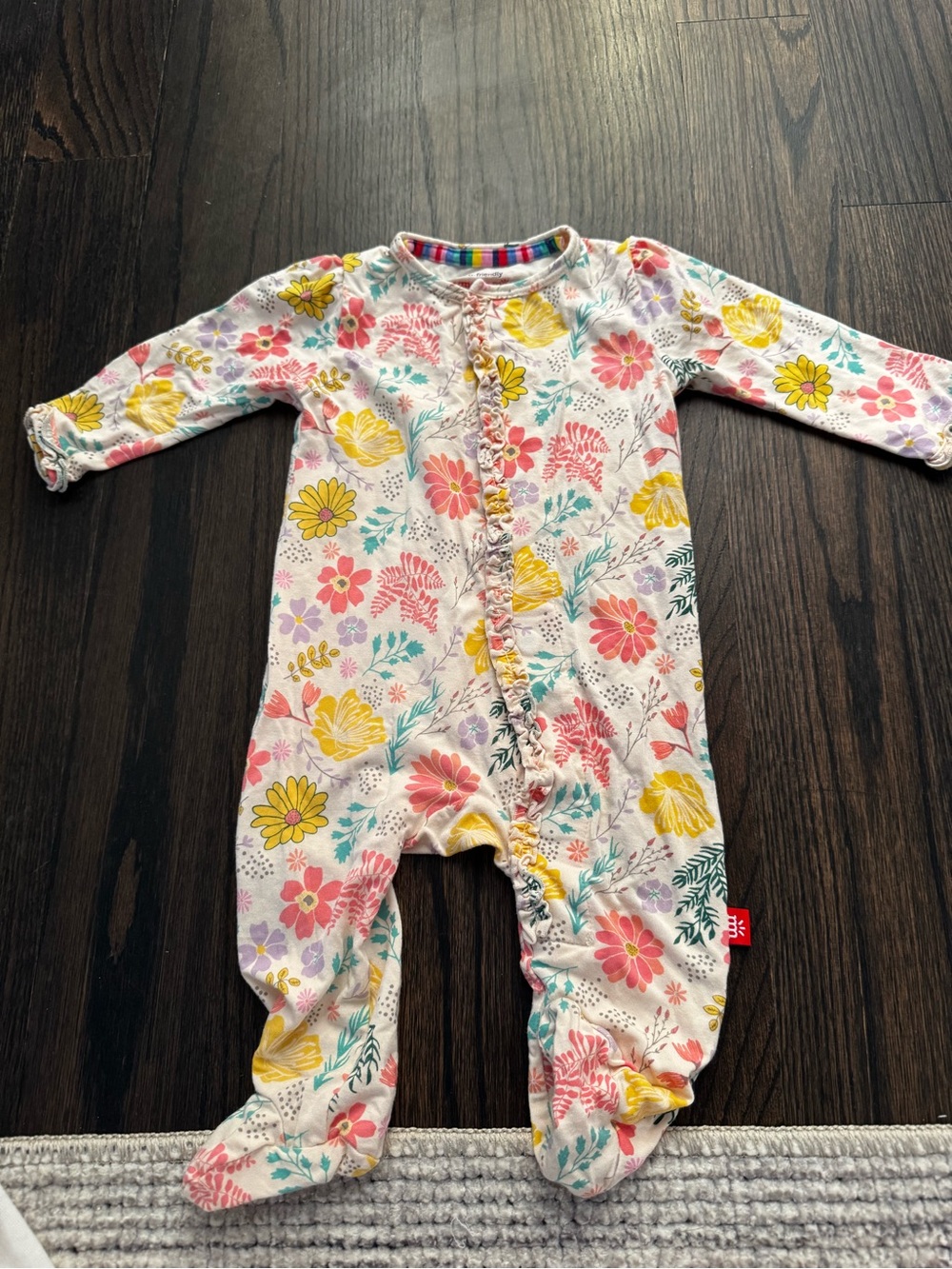 Magnetic Me Cream Floral Footed One-Piece with Yellow, Pink & Teal Flowers